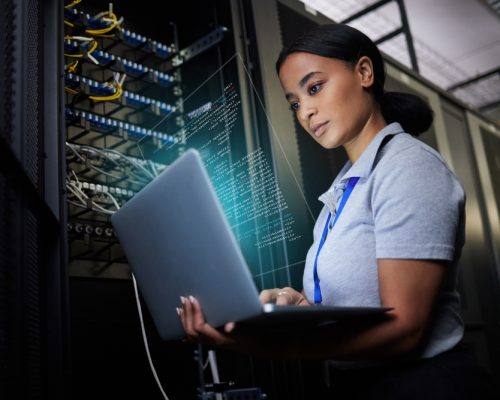Laptop,,Network,And,Data,Center,With,A,Black,Woman,It