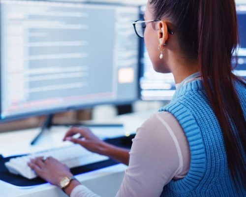 Programming,,Woman,And,Typing,On,Computer,For,Software,Development,,Cloud